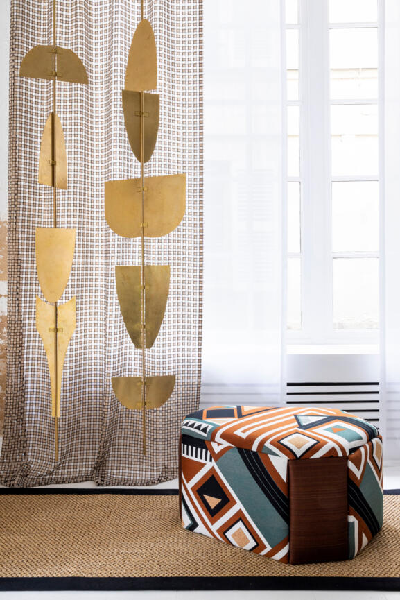 Curtains in Hamac Sable by Delapartdefred | Ottoman in Chaman Bush, Paddock Rouille design Emilie Paralitici by Jeffrey Vanhille | Sheers in Zephyr Blanc | Brass shutters by Georges © Raphaël Dautigny